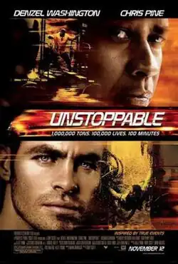 Theatrical release poster, featuring the face of Denzel Washington on the top right stacked above Chris Pine on the bottom left with the film's title behind a blur of the runaway train in the middle along with the film's tagline, "1,000,000 Tons, 100,000 Lives, 100 Minutes"