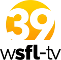 A white 39 on a yellow-orange rounded cut circle, suggesting a sun, next to the black letters "W S F L - T V" in lowercase in a sans serif with the S F L bolded.